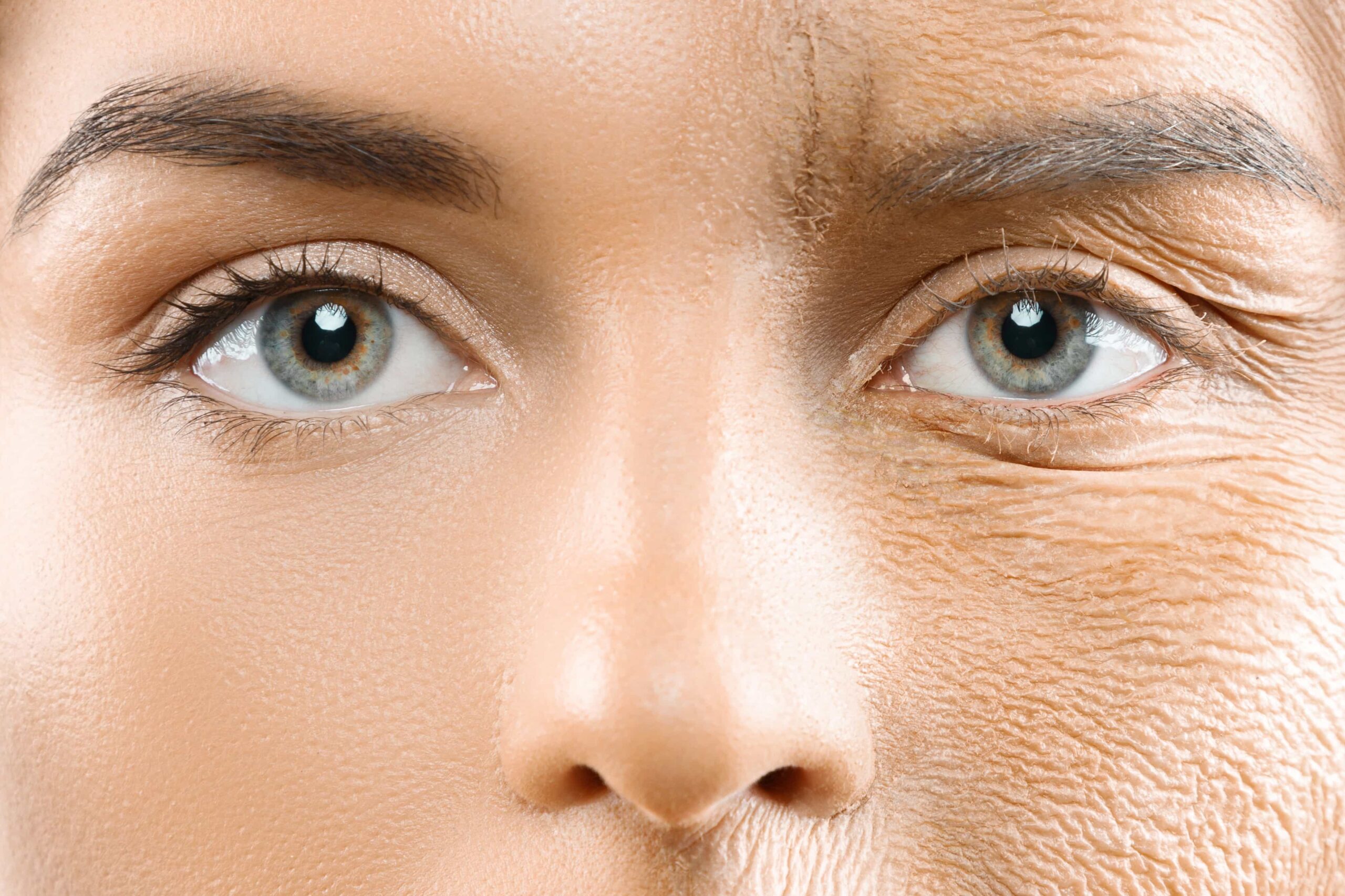 Clinician applying treatment to woman's eyebrow