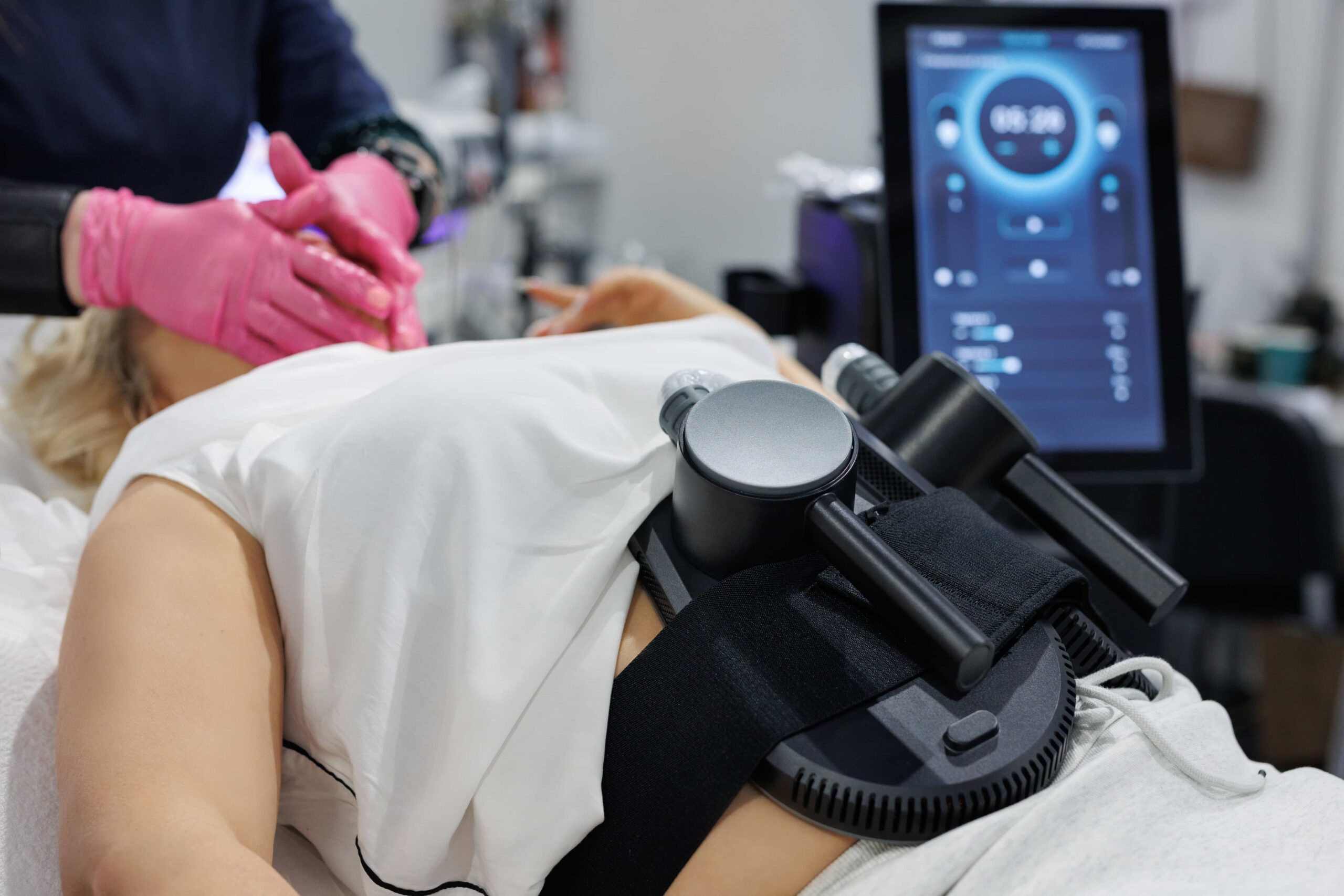 a woman is undergoing treatment to burn fat