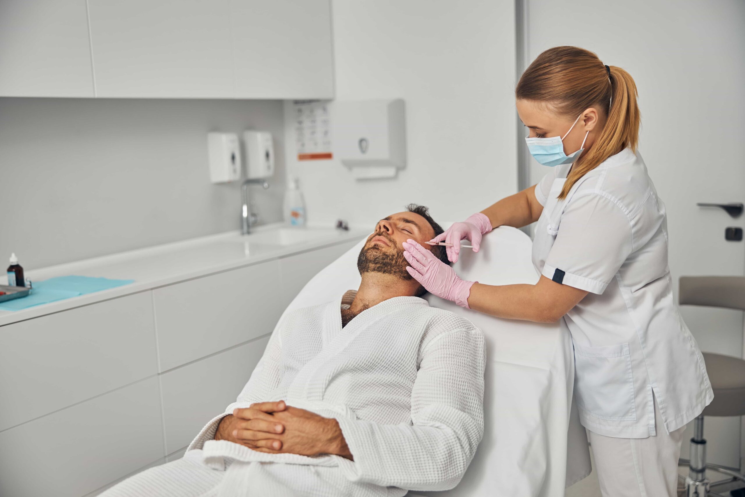 female doctor beautician making injection