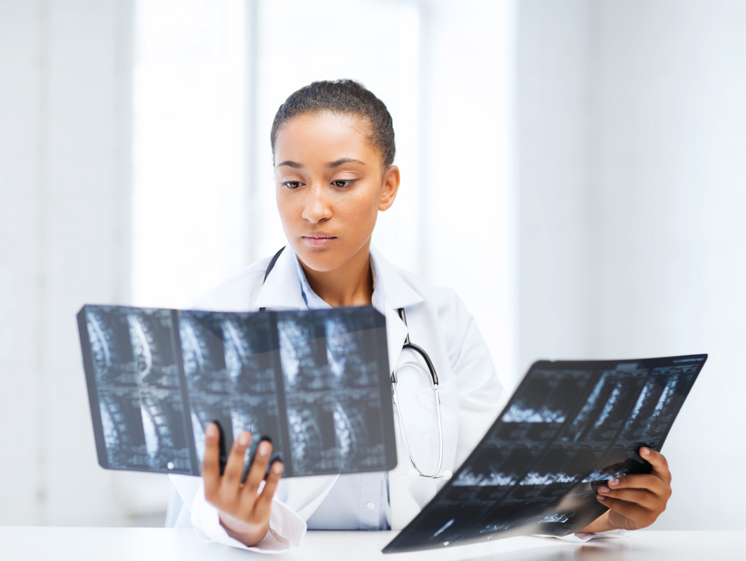 Radiologist looking at scans