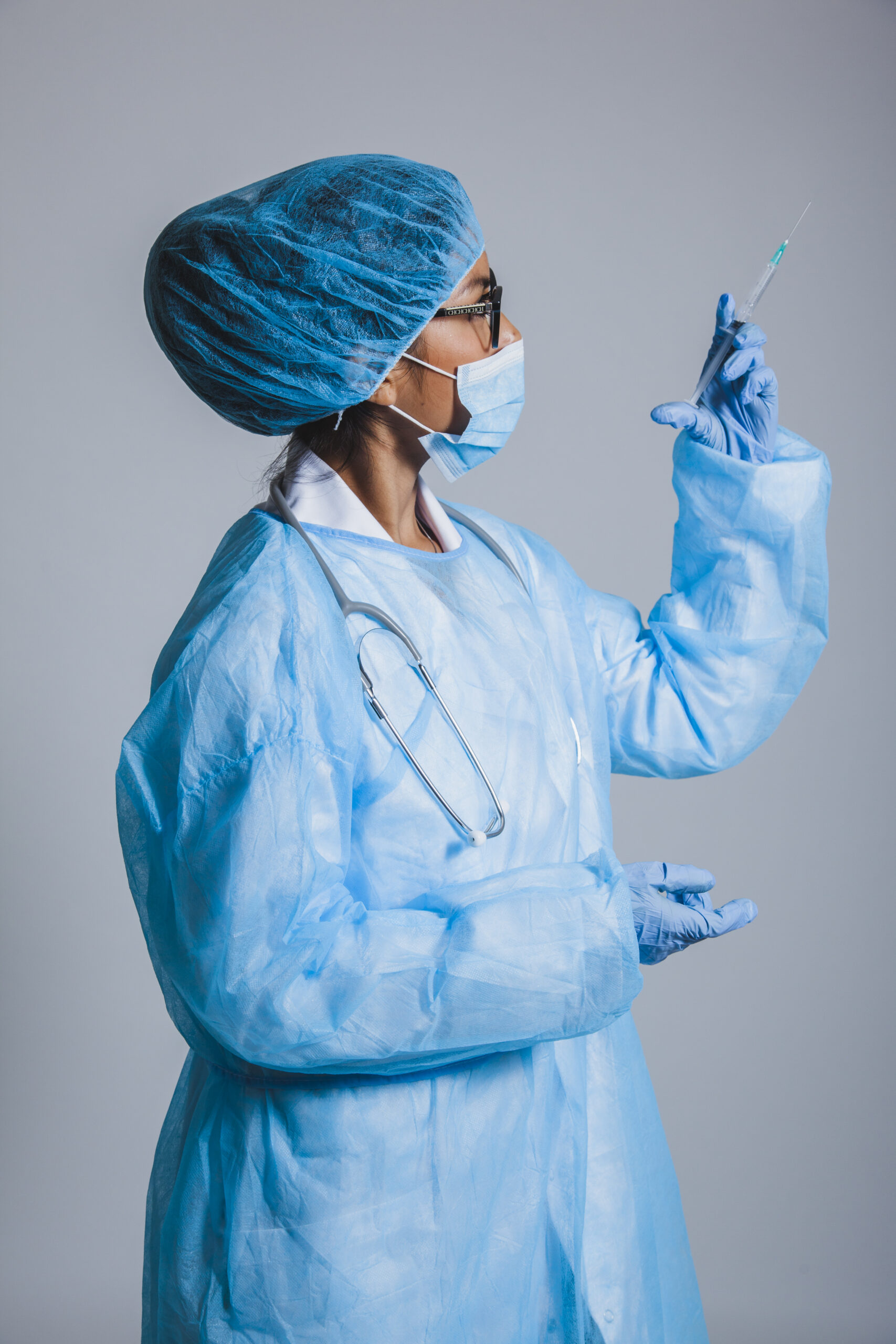 Specialist surgeon testing a needle
