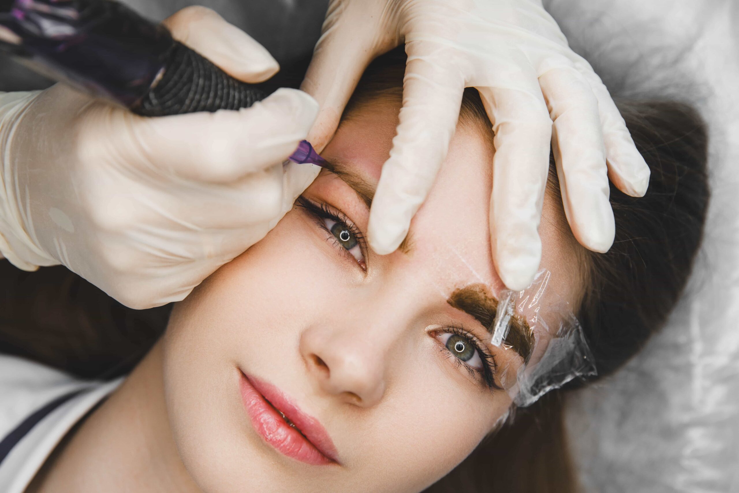 Woman receiving microblading