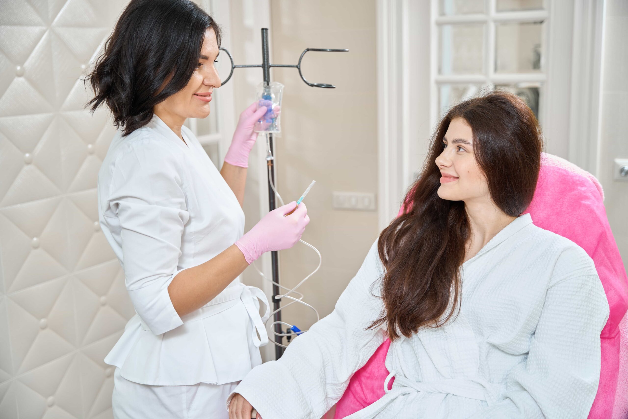 Woman receiving radio frequency body sculpting