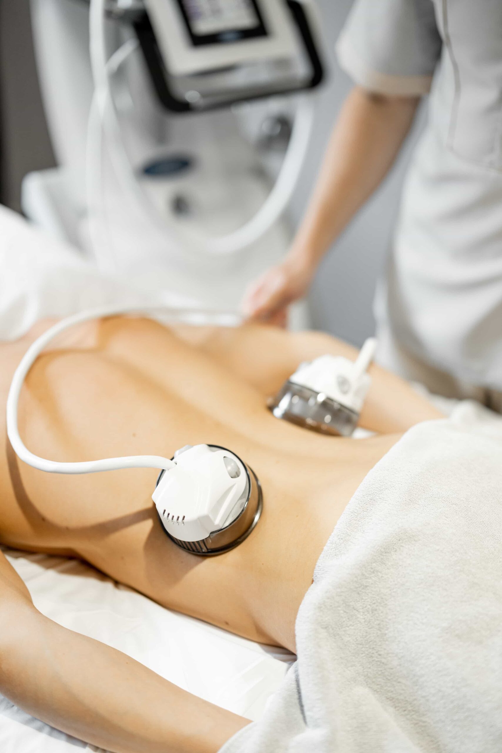 Image showing body sculpting treatment taking place 