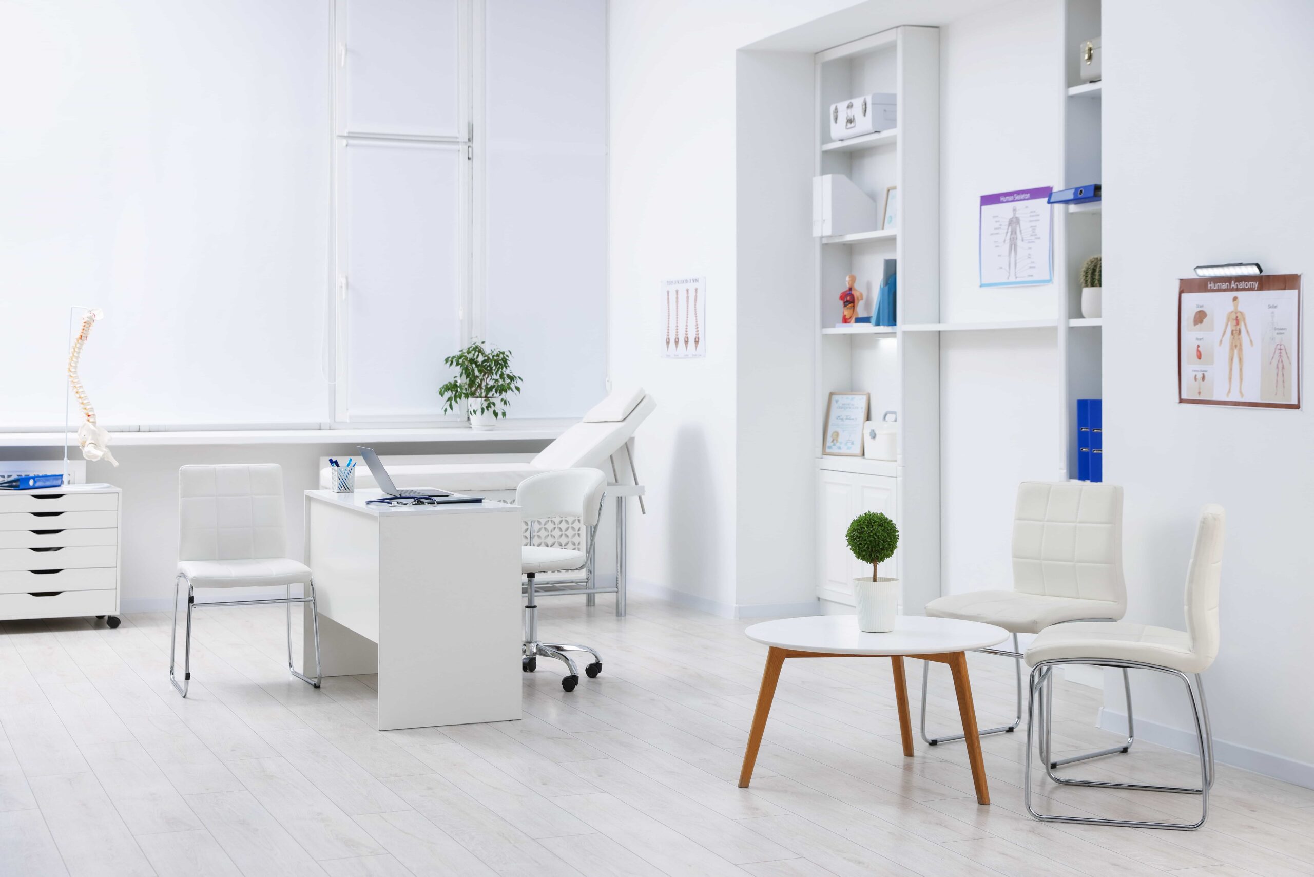 Image showing clean doctor's office with desk and chairs. 
