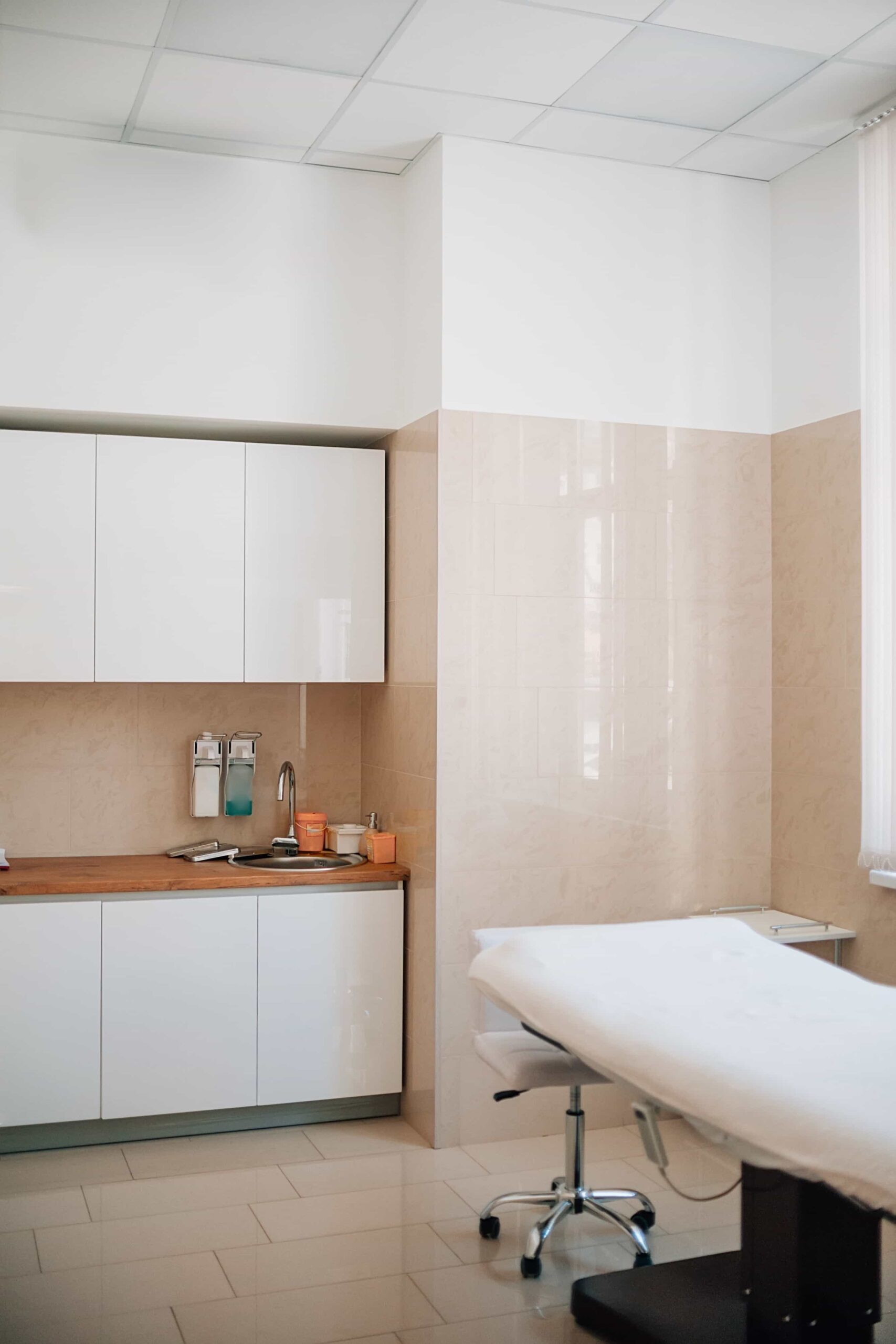 Clinic setting with bed for physiotherapy. 
